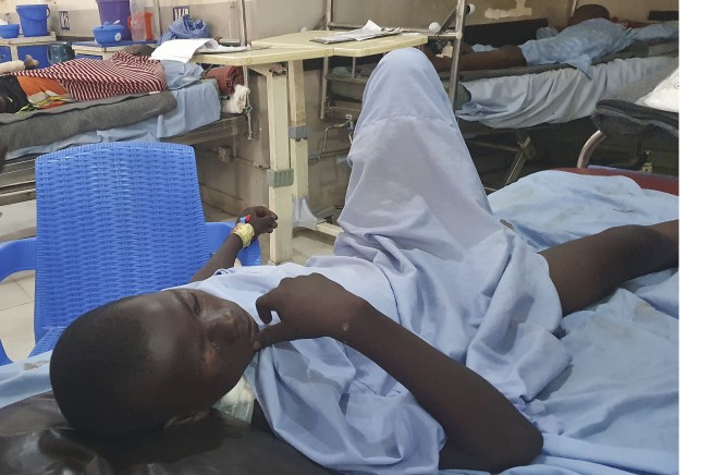 Female suicide bombers kill at least 18 in coordinated attack in Nigeria, authorities say