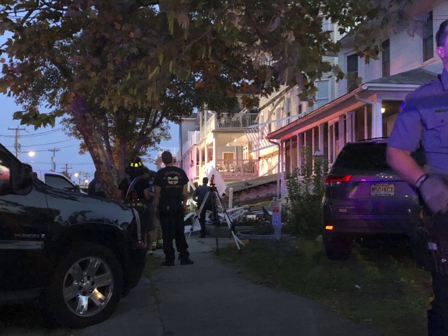 The Latest: At least 22 people injured in deck collapse