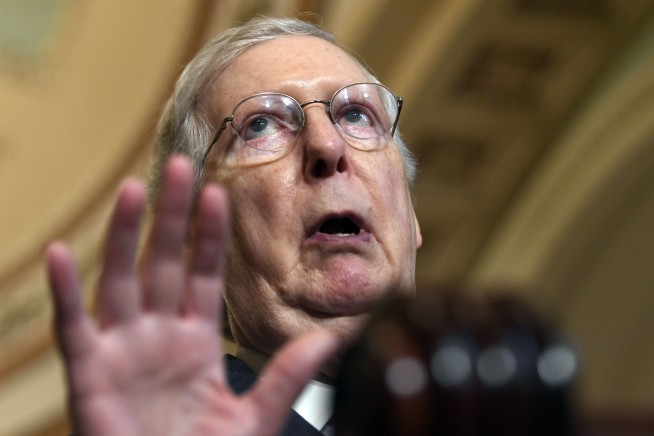 The Latest: Pelosi asks Trump to push Senate on gun bill