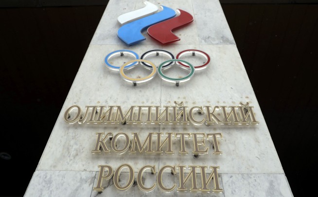 Russia banned from using its name, flag at next 2 Olympics