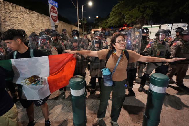 Protests over immigration raids pop up across the US with more planned