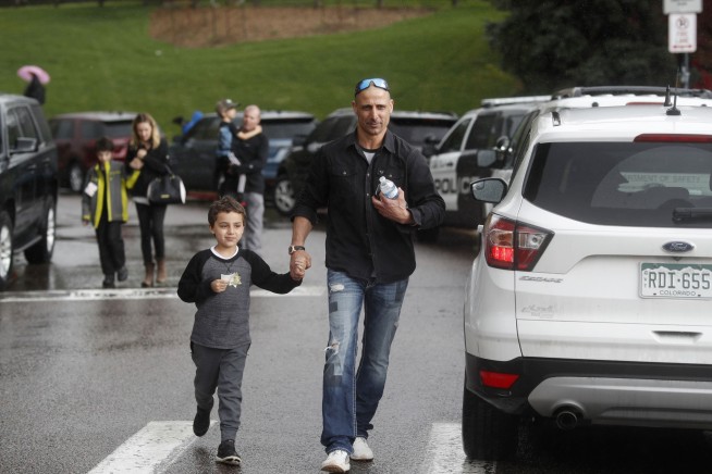 The Latest: 1 suspect in Colorado school shooting identified