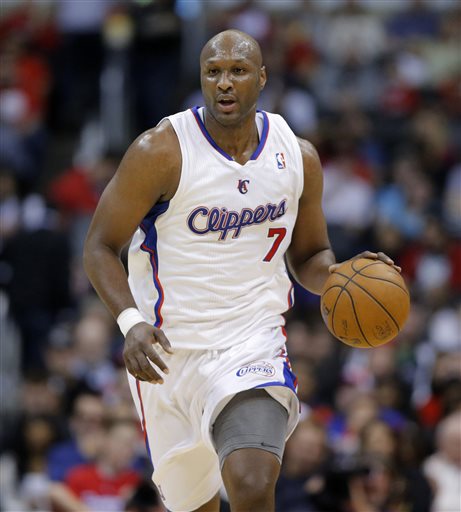 The Latest: Spokesman says Odom was on 1st visit to brothel