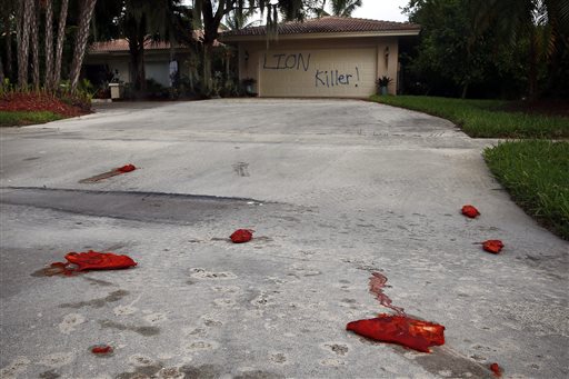 Vandals attack vacation home of dentist who killed Cecil