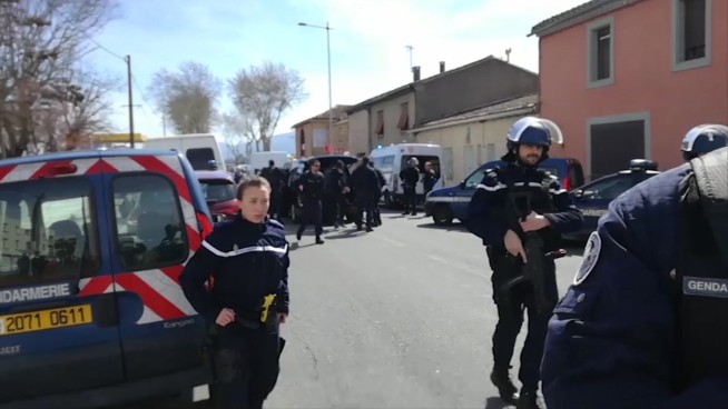 Hostage-taker in France kills 3, is shot dead by police