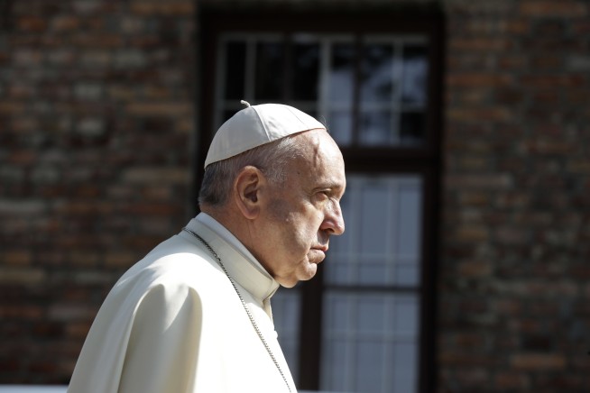 Pope visits Auschwitz, prays at saint's cell