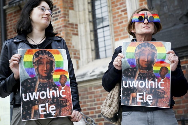 Woman held in Poland for adding LGBT rainbow to revered icon