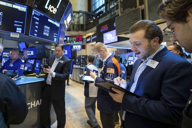 Stocks end mixed as traders parse next rate move by the Fed