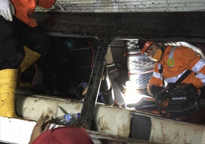 Indonesia bus plunges into a ravine, killing 27 pilgrims