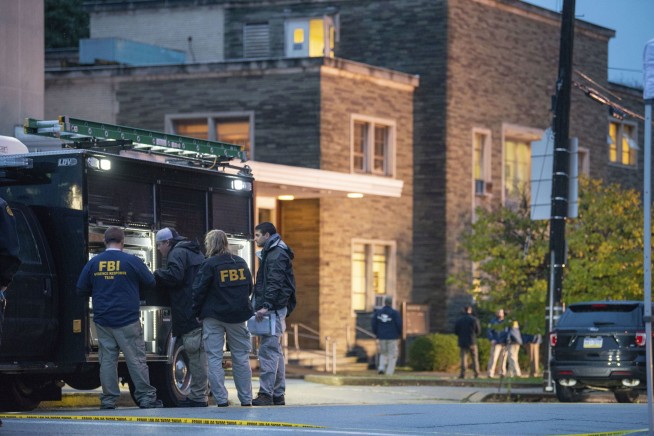 The Latest: Married couple, brothers among synagogue victims