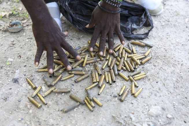 Survivors of massacre in small Haitian town where 70 died point finger at government