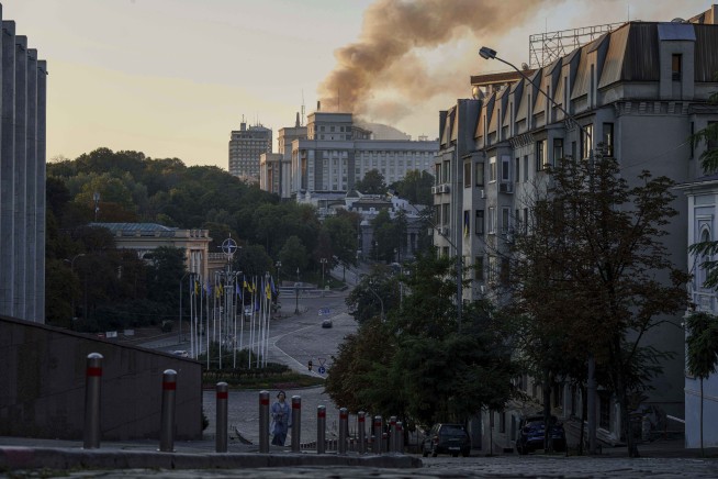 Ukraine government building damaged in Kyiv in the largest Russian attack since the war began