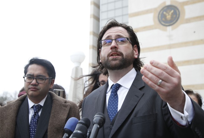 The Latest: Judge in Hawaii puts Trump's travel ban on hold