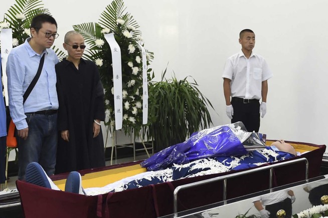 Family scatters jailed Chinese Nobel laureate's ashes in sea