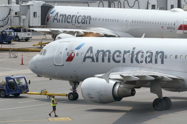 American cites Boeing delay in trimming international plans
