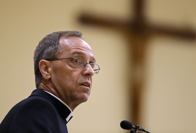 Archdiocese: School with gay teacher can't use Catholic name