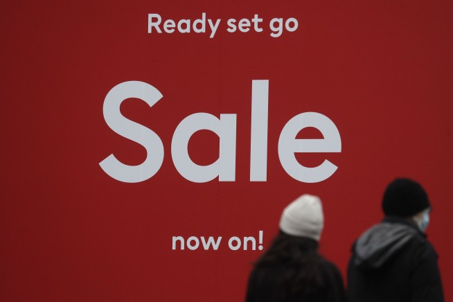 The Latest: Number of global COVID-19 cases tops 80 million