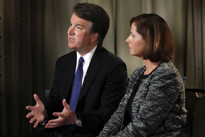 The Latest: Trump: Dems playing 'con game' with Kavanaugh