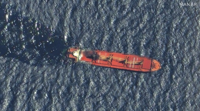 A ship earlier hit by Yemen's Houthi rebels sinks in the Red Sea, the first vessel lost in conflict