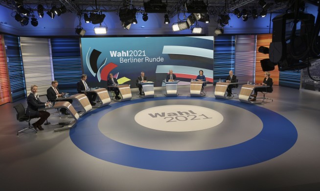 Social Democrats narrowly beat Merkel's bloc in German vote