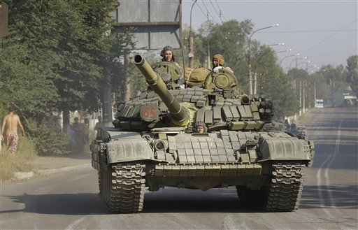 Weapons convoys seen rolling in eastern Ukraine