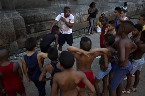 AP Photos: Children learn wrestling in Old Havana
