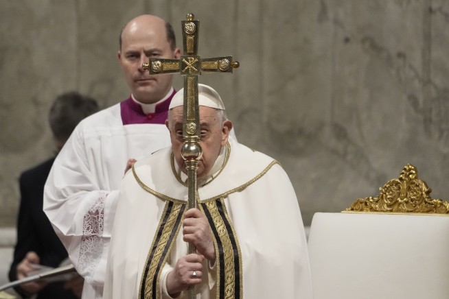 Pope says 'our hearts are in Bethlehem' as he presides over the Christmas Eve Mass in St. Peter's