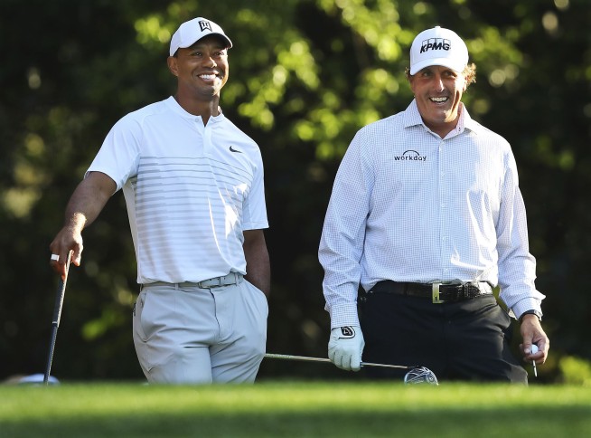 Woods, Mickelson, QBs to donate $10 million to virus relief