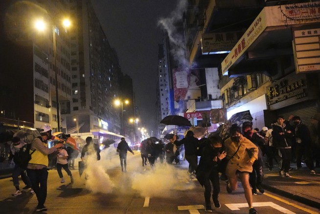 Overnight clashes extend Hong Kong protests into new year