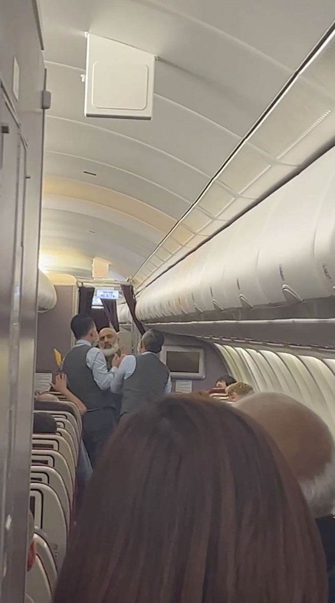 Passenger arrested after flight from Australia to Malaysia returns to Sydney in 'emergency incident'