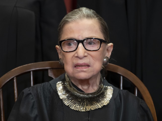 Ginsburg missing Supreme Court arguments for 1st time