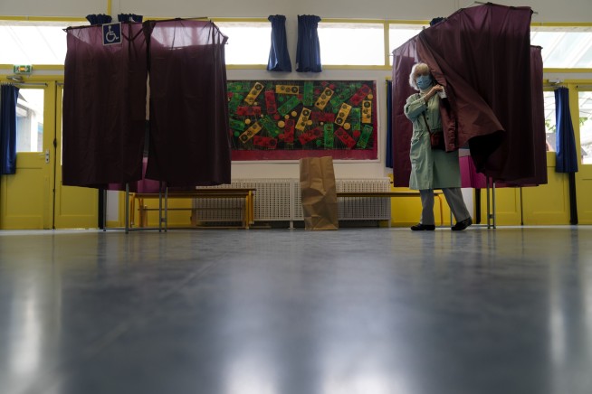 France's Macron is reelected but far-right rival raises game