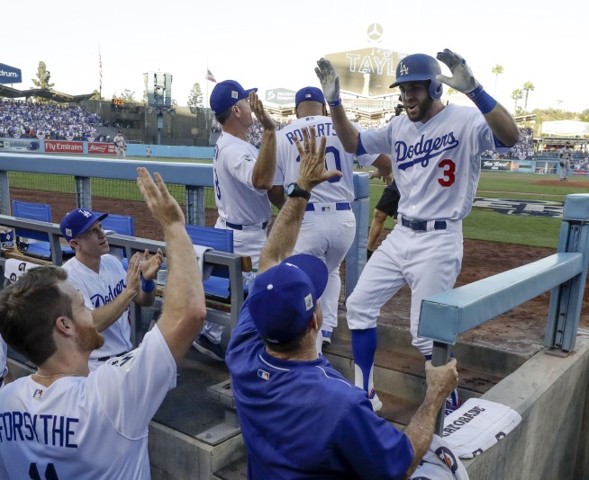The Latest: Dodgers take Game 1 over Astros 3-1