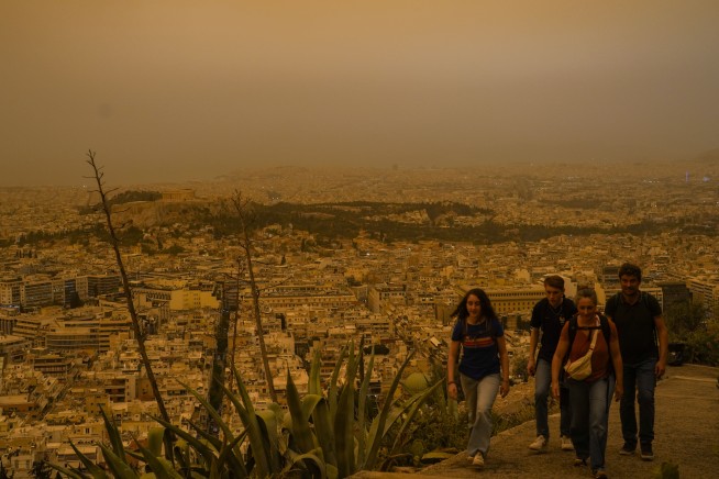 Martian skies over Athens? Greece's capital turns an orange hue with dust clouds from North Africa