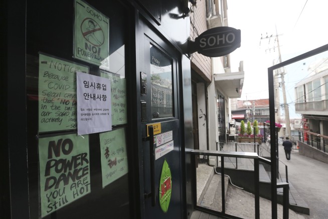 The Latest: US Senator to self-quarantine, staffer positive