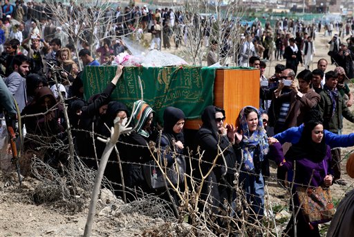 Afghanistan buries woman beaten to death by mob