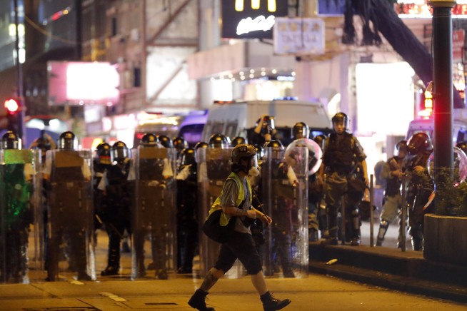 Hong Kong residents demand release of arrested woman