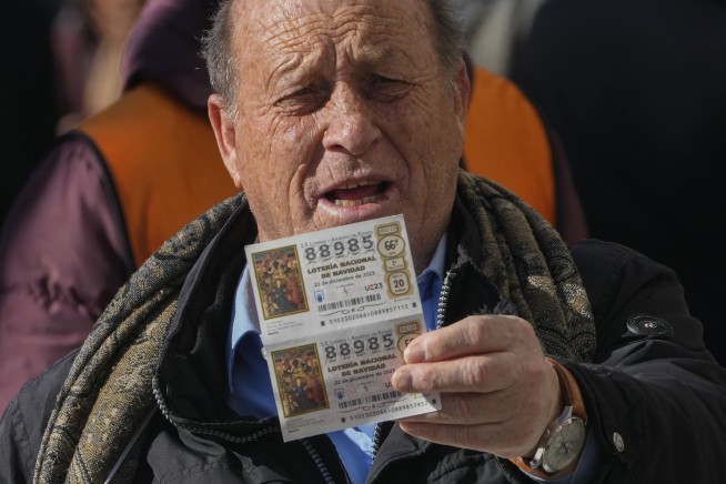 The top prize in Spain's 'El Gordo' Christmas lottery goes to tickets with the number 88008