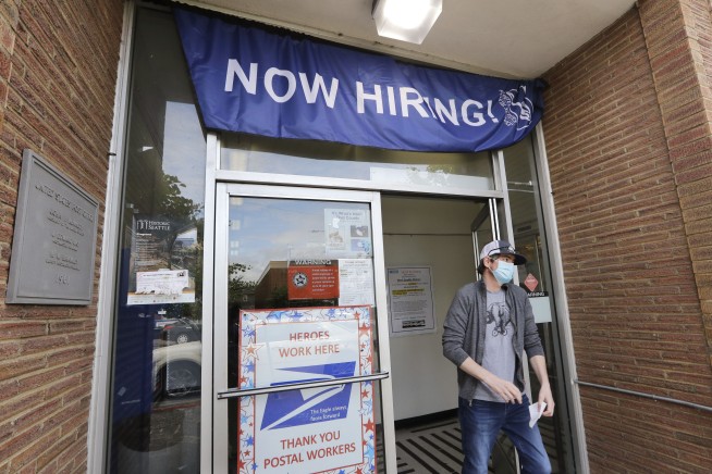 1.5 million more laid-off workers seek unemployment benefits