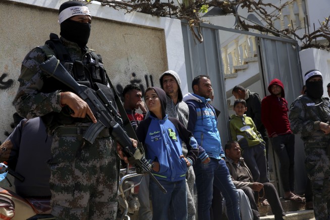 The Latest: 12 killed, 1,000 hurt in Israel-Gaza clashes