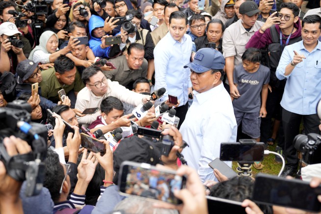 Former Indonesian general linked to human rights abuses claims victory in presidential election