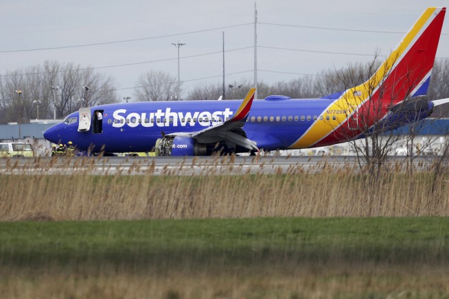 The Latest: Woman killed in emergency landing identified