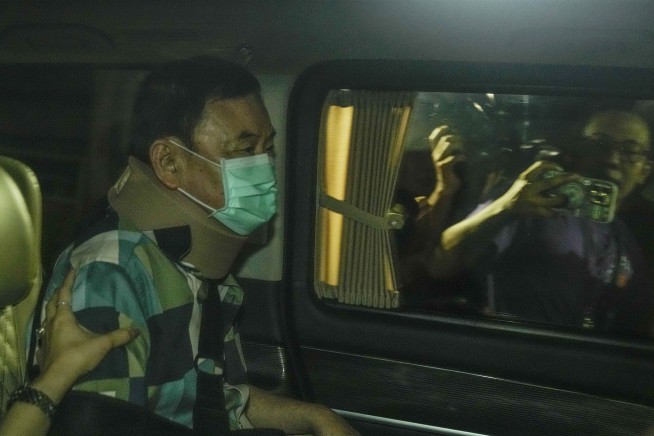Thai ex-Prime Minister Thaksin, just freed from detention, may still face a royal defamation charge