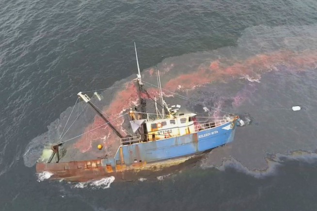 3 rescued and fuel spilled from fishing boat capsized in Boston Harbor