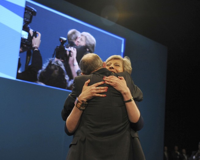 Cough, prankster make May's British Dream speech a nightmare