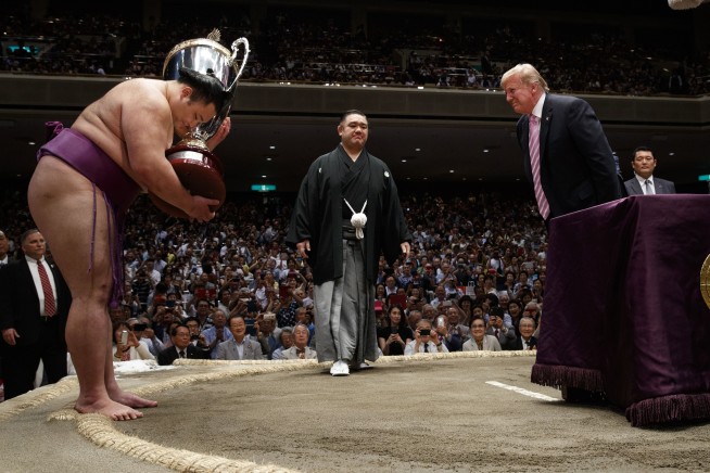 Sumo diplomacy: Abe courts Trump with burgers, golf, more