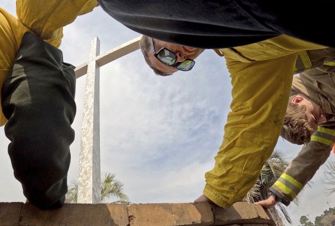 Crews battle wildfires in North and South Carolina amid dry conditions and gusty winds