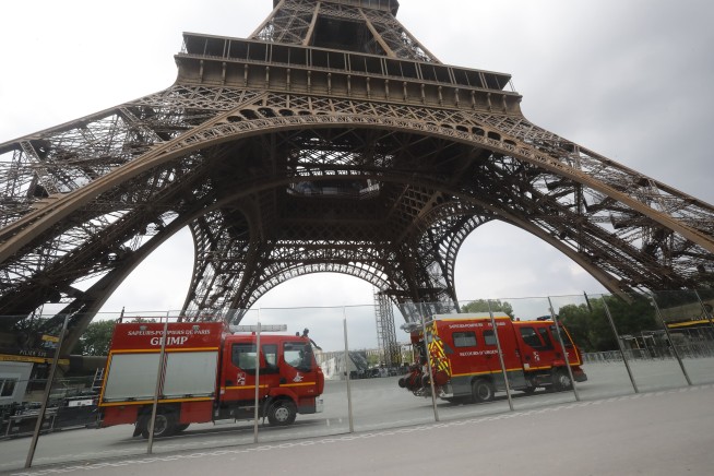 Eiffel Tower closed down after intruder tries to climb up