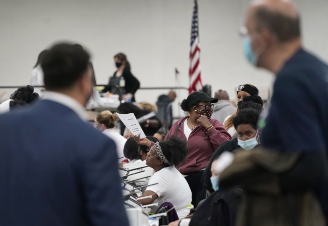 Election officials scramble to count ballots in key states