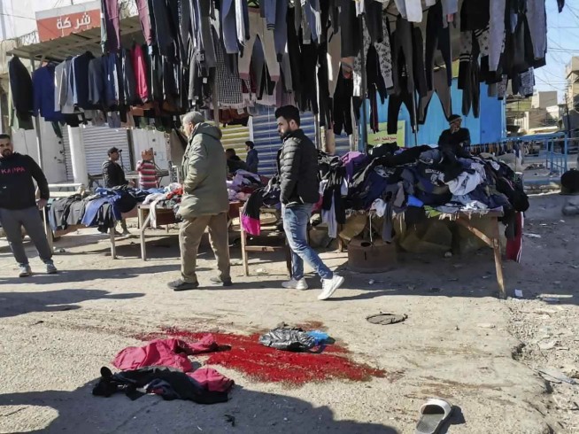 Twin suicide bombings rock central Baghdad, at least 32 dead